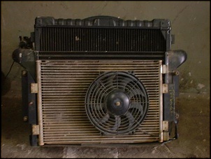 KIT RADIADOR, INTERCOOLER, CONDENSADOR, VENTUINHA ELETRICA E DEFLETOR ORIGINAL DE TROLLER MWM