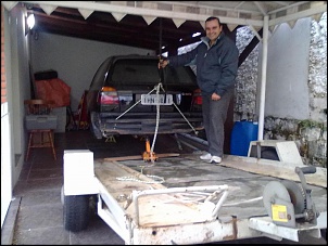 Cintas p/ Reboque-limpando-garagem.jpg