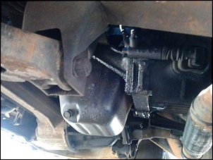 Bomba Injectora Sportage-em-baixo-atra-s-da-roda-esquerda.jpg