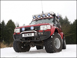 Defender 110 chegou no &quot;Polo frio&quot; na Siberia.-129_0909_21_z-1996_land_rover_discovery-front_view_snow.jpg