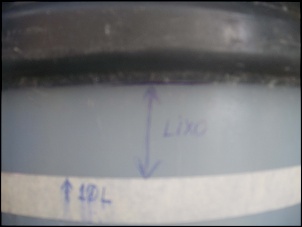 -4-detalhe-de-2-5l-de-alcool-lixo.jpg
