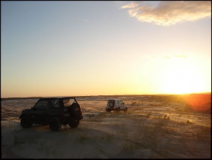 Ajuda na areia-tuia1.jpg