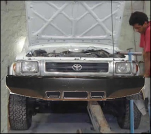 -hiluxinner-parachoque709preto.jpg