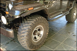 Vendo 4 pneus 35 Mudzilla montados em 4 rodas Mangels Kombat 15x8 6 furos Troller-dsc01924.jpg