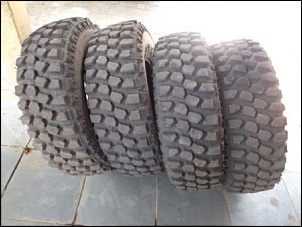 Vendo 4 pneus 31 modelo papa barro genius semi novos-dscf4481.jpg