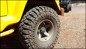 Vendo Jogo de pneus 33x12.5 R15 e rodas R15x9 6 furos-89282d600d377e55c5a3ad455123e047.jpg