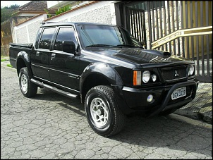 VENDO L200 GLS HPE 2.5 131cv 2002/2003-lateral1.jpg